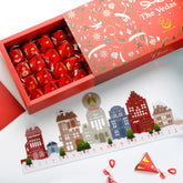 The Vedas Luxury Advent Calendar of teas | 24 Different flavours | Handstitched cotton teabags | Christmas theme scenery frame to hang 24 days of surprise pyramids