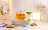 The Vedas Tea chest Premium Tea gift set | 48 handstitched cotton teabags | 12 flavours | 1 The Vedas Branded Mug with Infuser | 1 Sand clock specially designed for our teas | 1 Coaster