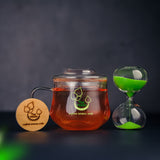 The Vedas Tea chest Premium Tea gift set | 48 handstitched cotton teabags | 12 flavours | 1 The Vedas Branded Mug with Infuser | 1 Sand clock specially designed for our teas | 1 Coaster